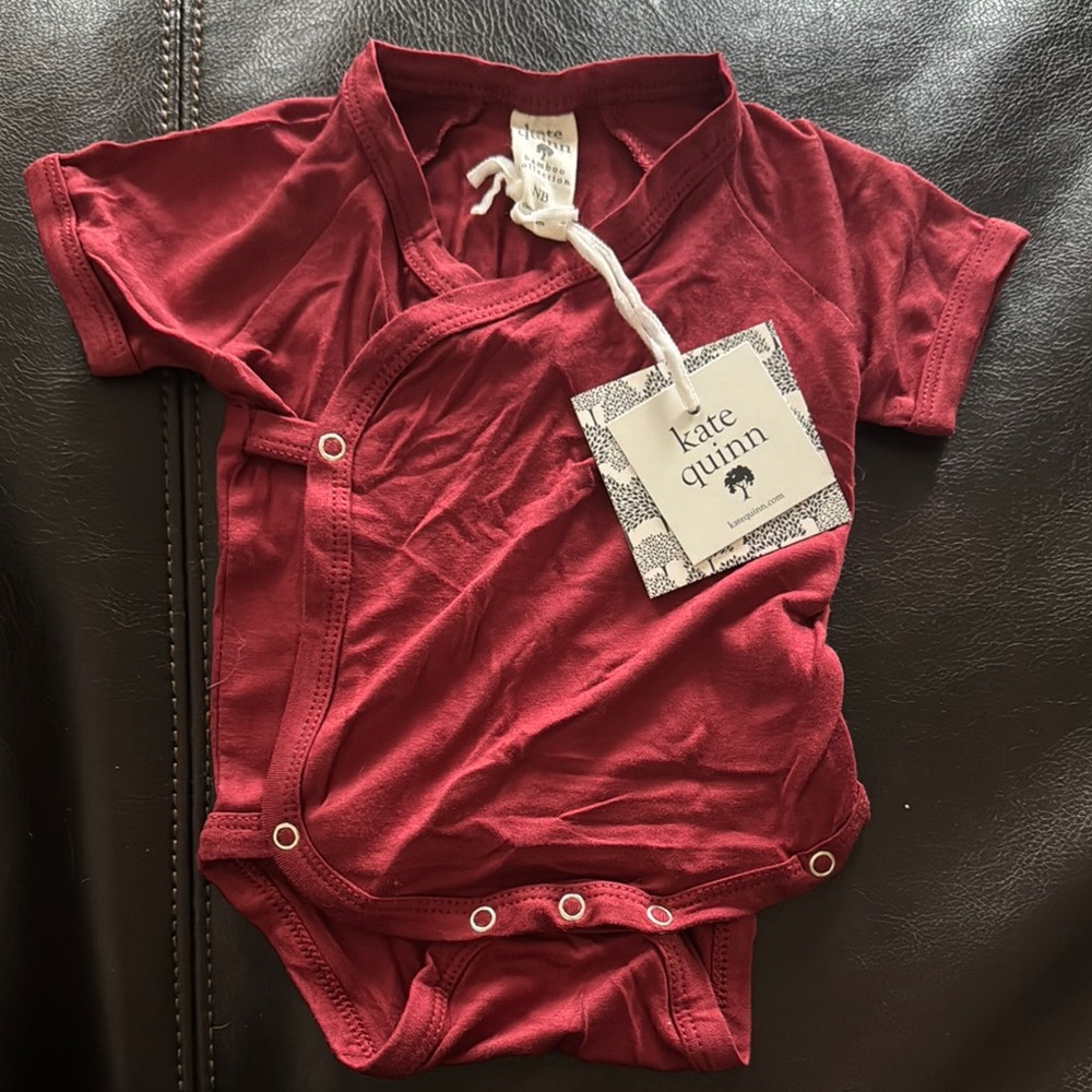 Kate Quinn Onesie